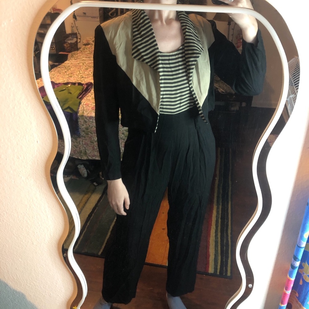 Black and white striped jumpsuit with belt loops, zipper back